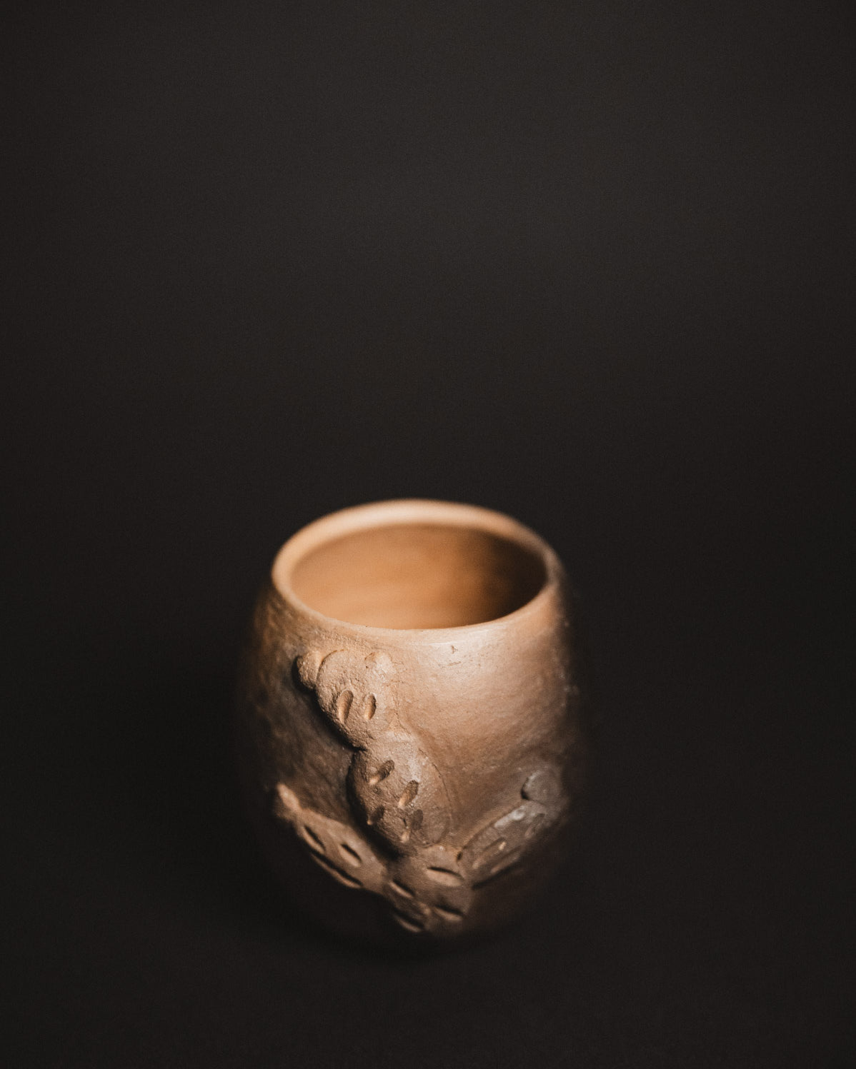 Oaxacan Black Clay Cactus mezcal copita on black background