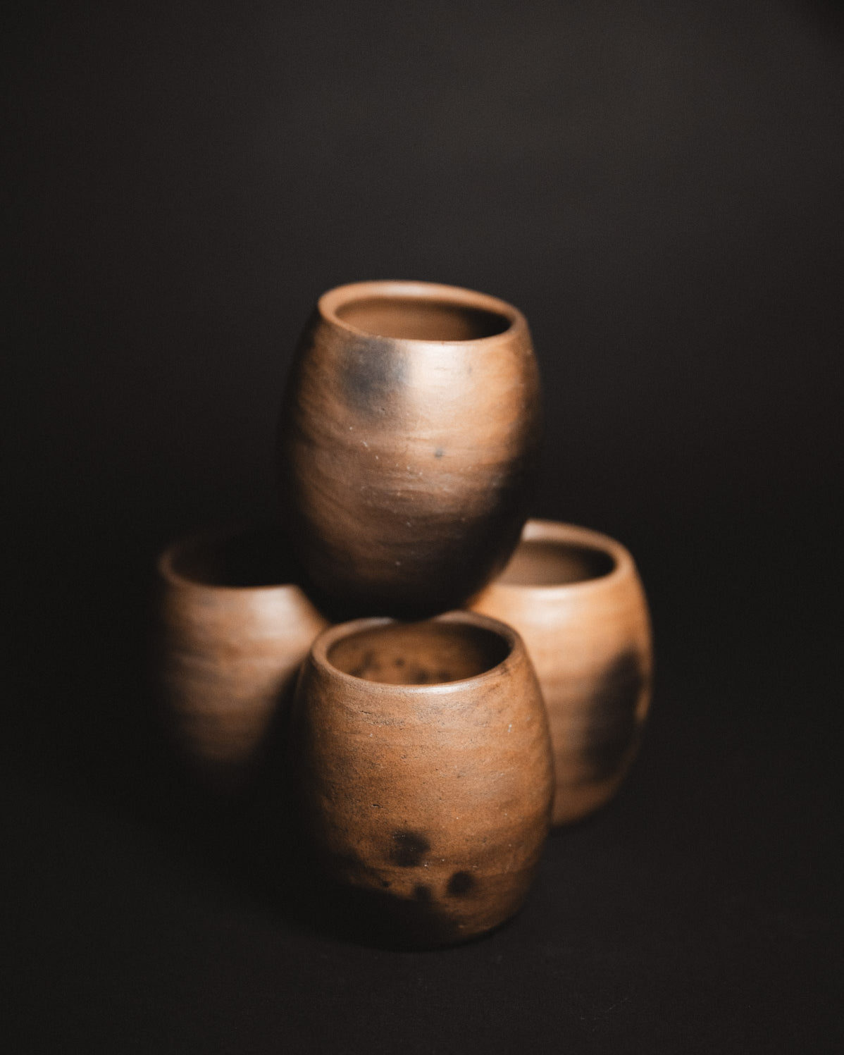 Oaxacan Black Clay mezcal copita on black background