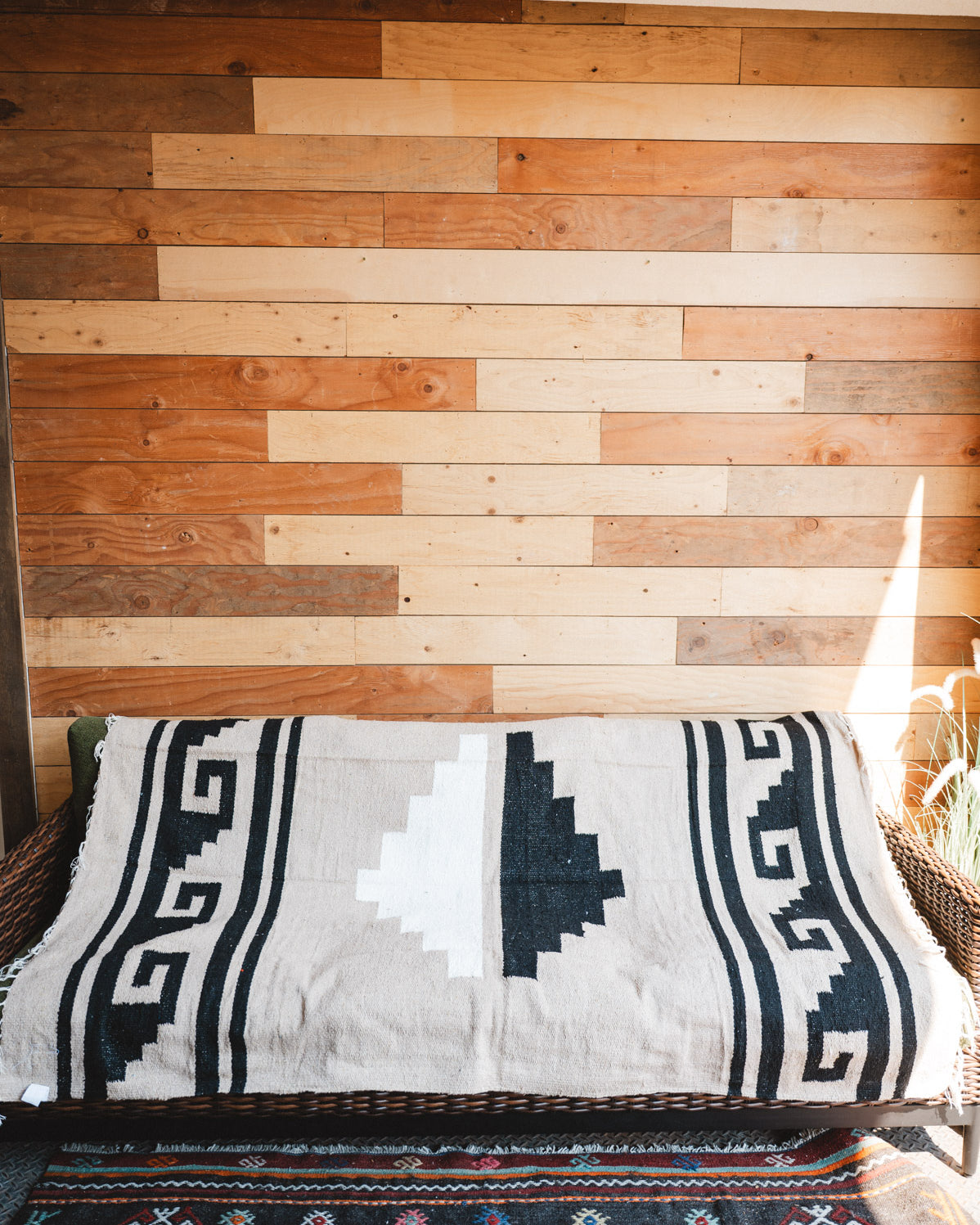 Handwoven Mexican Blanket beige Mixteca Greca  pattern in modern industrial setting