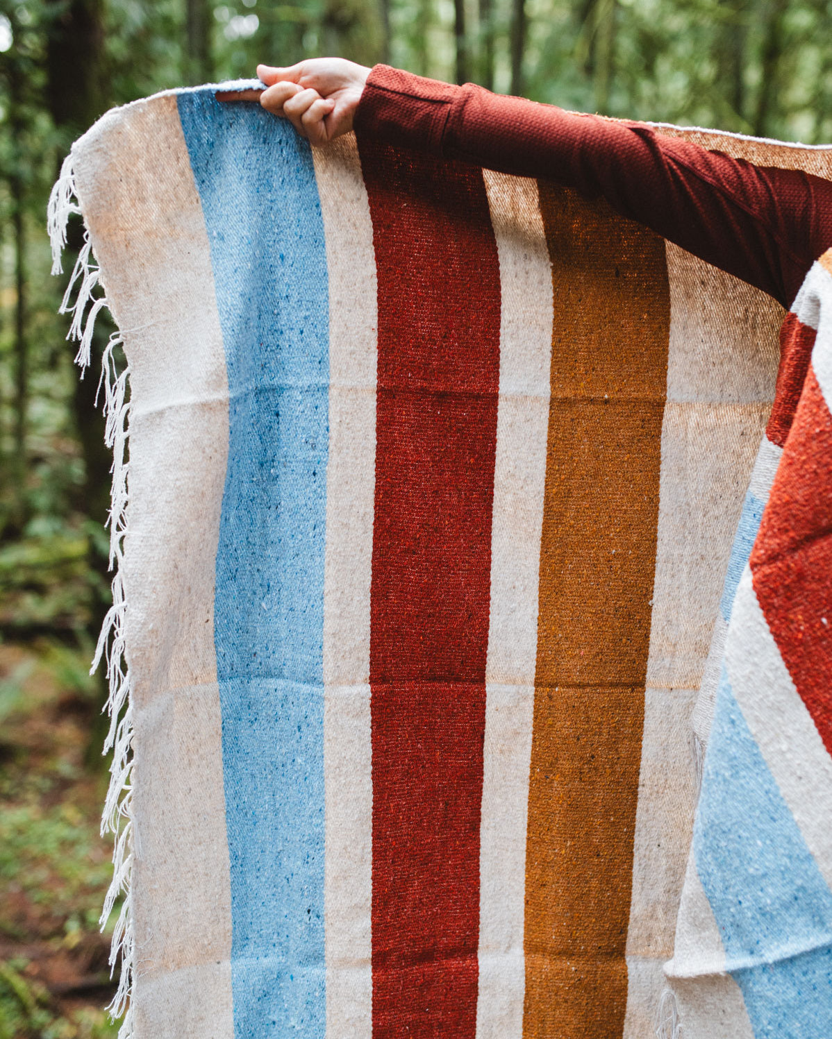 Rust gold blue striped blanket