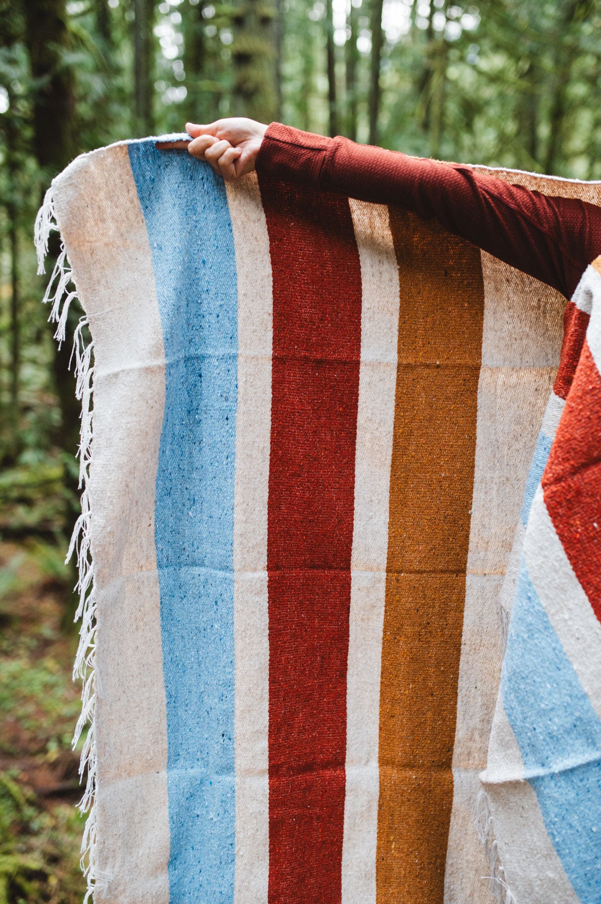 Rust gold blue striped blanket