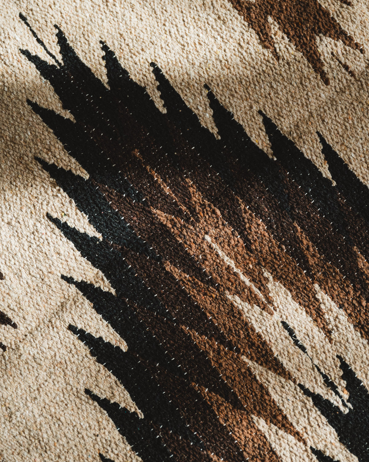 Handwoven brown and beige diamond mexican blanket