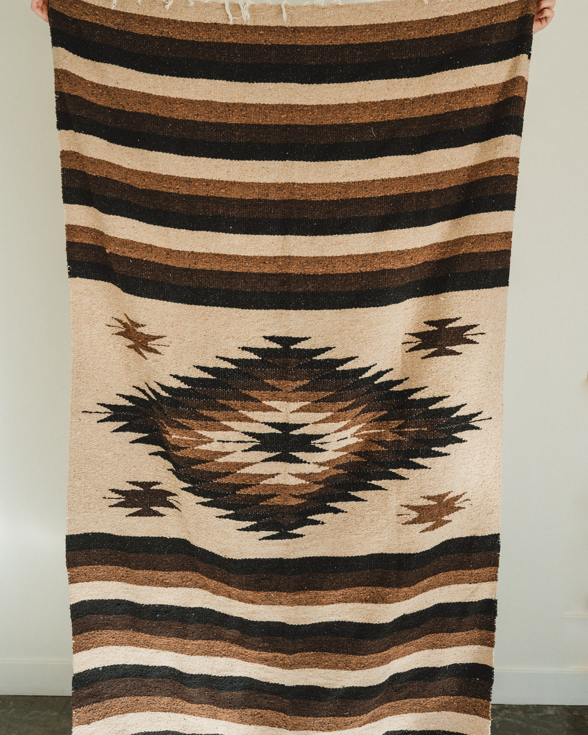 Handwoven brown and beige diamond mexican blanket