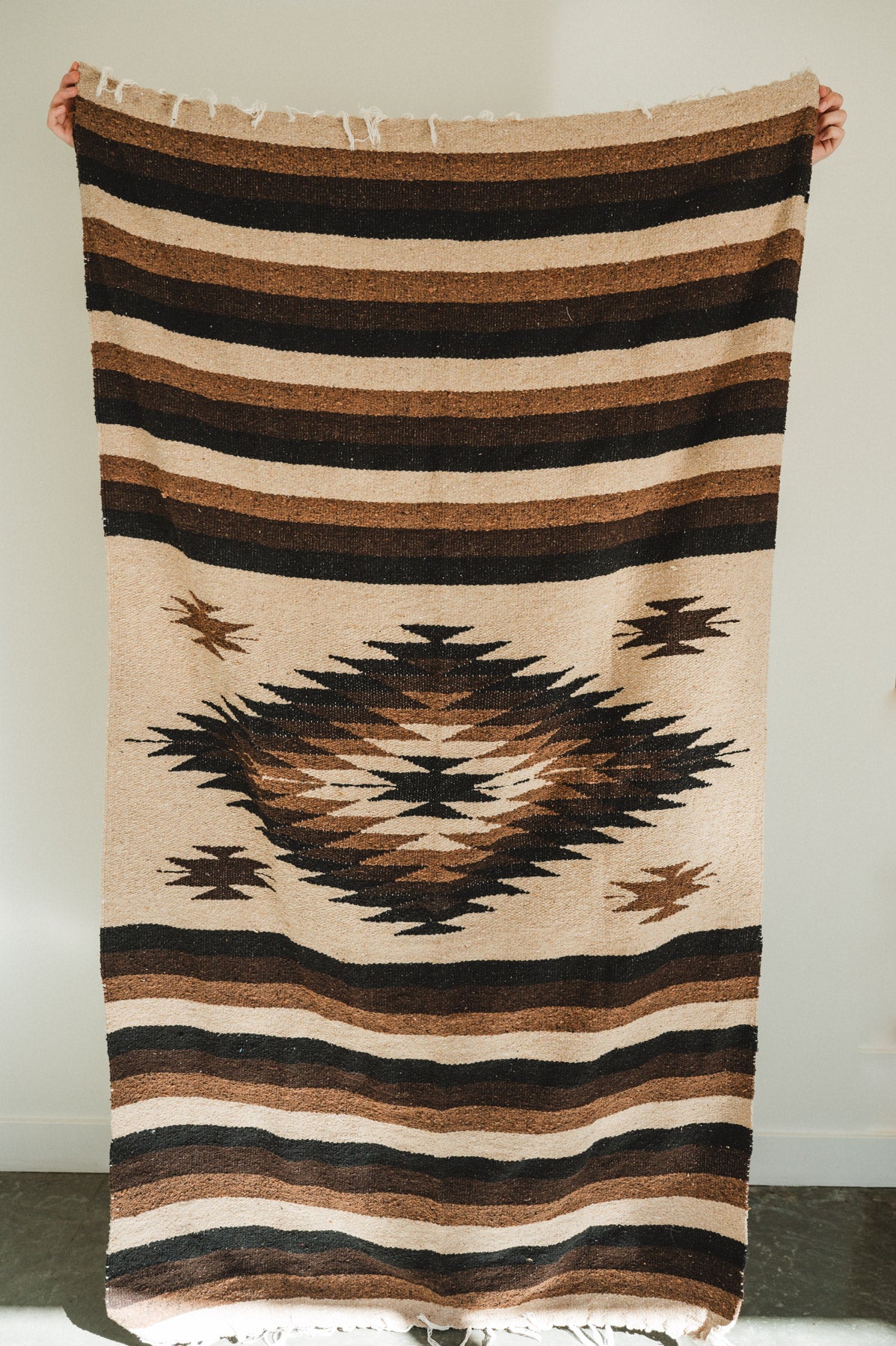 Handwoven brown and beige diamond mexican blanket