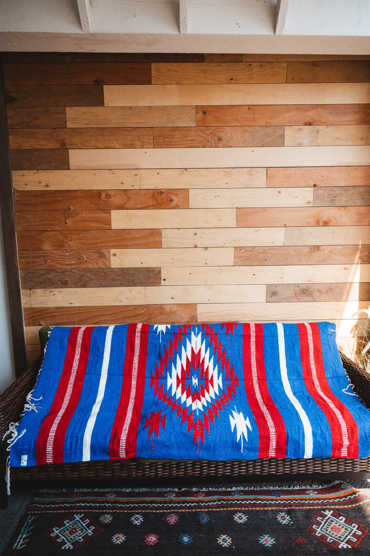 Handwoven Mexican Blanket Buffalo USA color Diamond pattern in modern industrial setting
