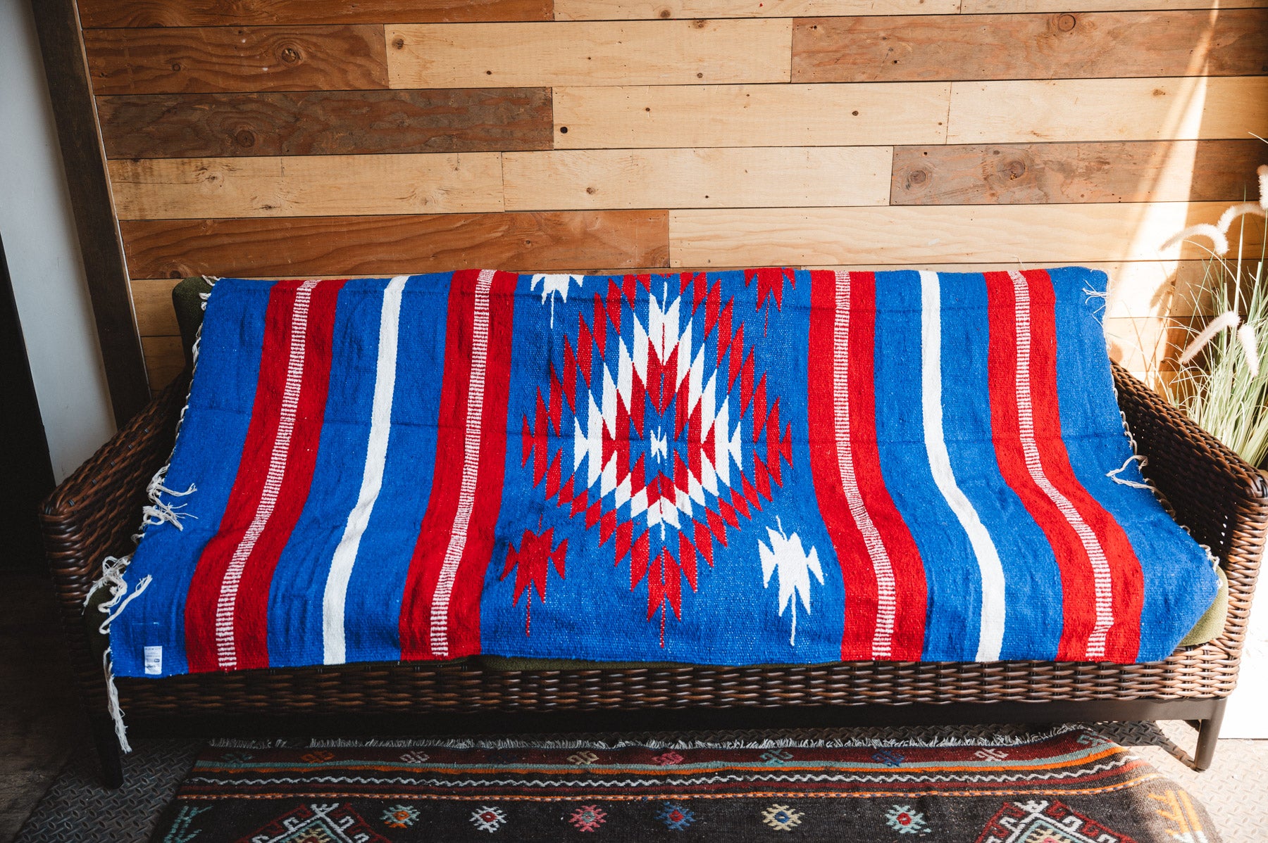 Handwoven Mexican Blanket Buffalo USA color Diamond pattern in modern industrial setting