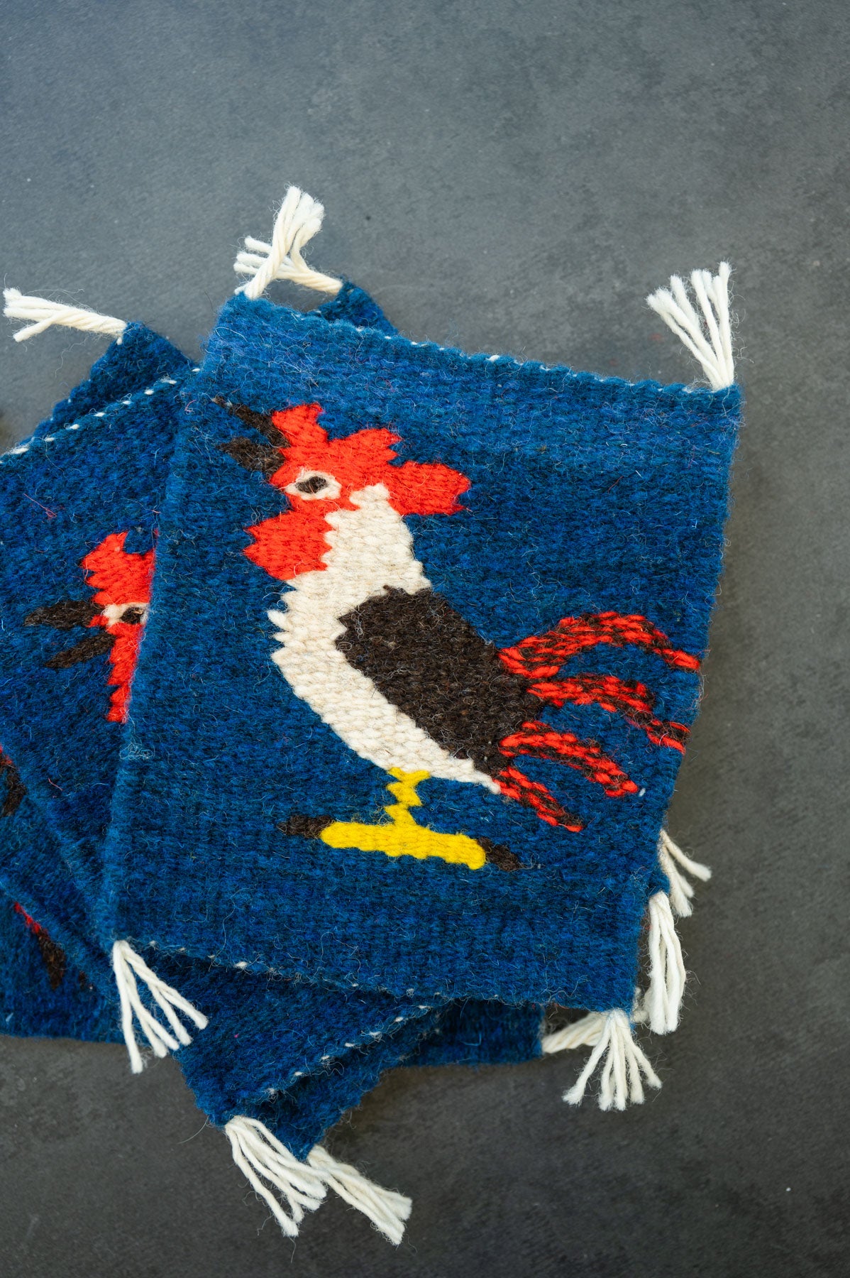Handwoven wool coaster from Teotitlan Del Valle of an rooster