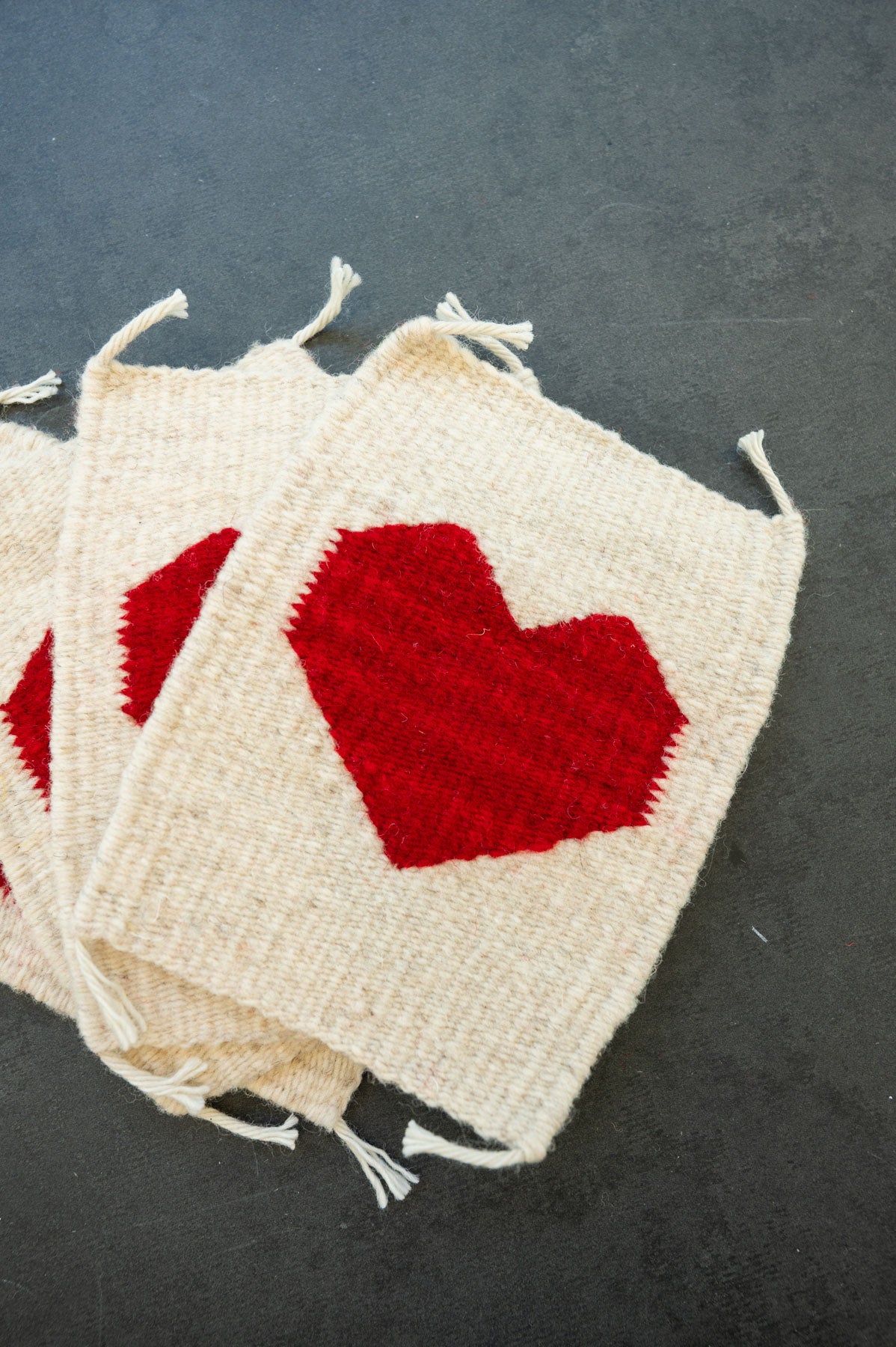Handwoven wool coaster from Teotitlan Del Valle of a heart