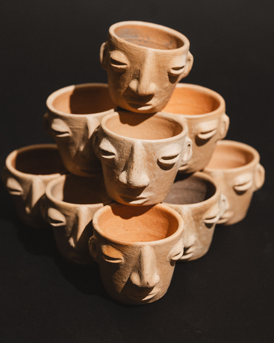 Handmade clay carita mezcalero cups from Oaxaca
