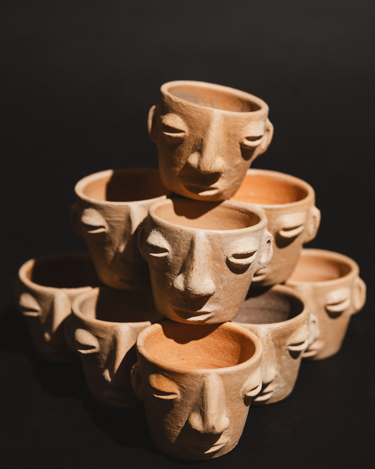 Handmade clay carita mezcalero cups from Oaxaca