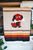 Handwoven Mexican Dog blanket in modern industrial setting