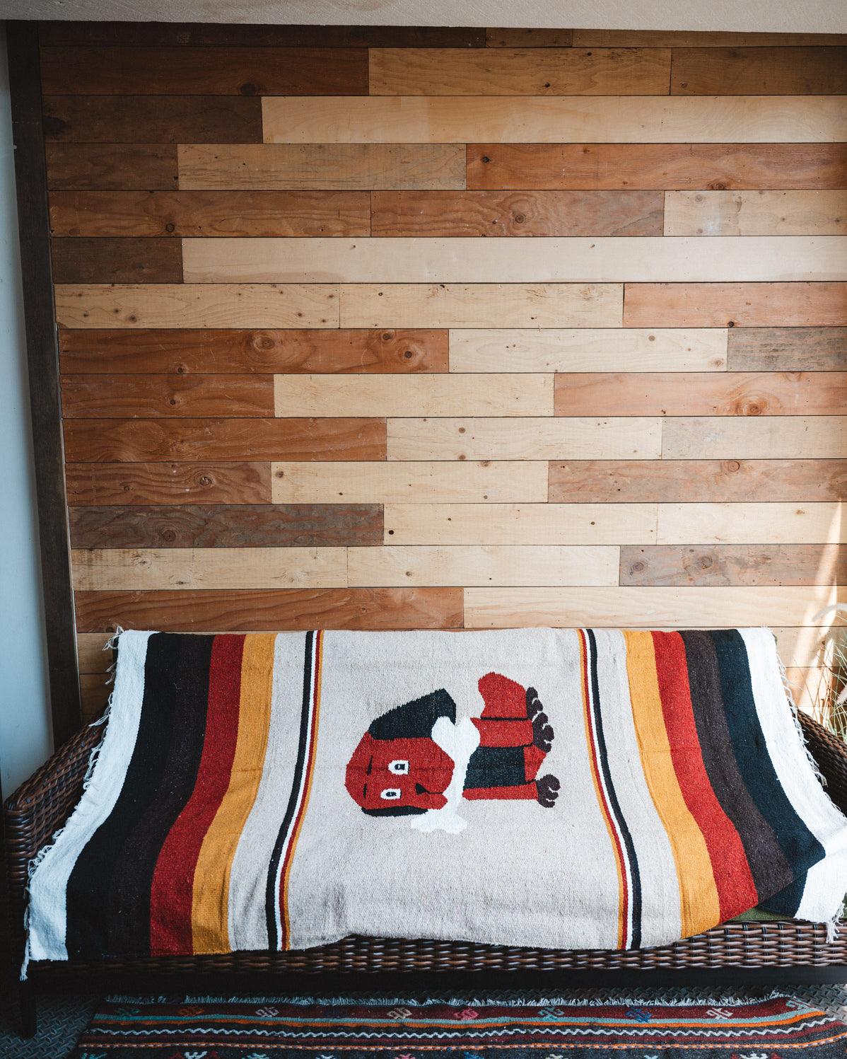 Handwoven Mexican Dog blanket in modern industrial setting