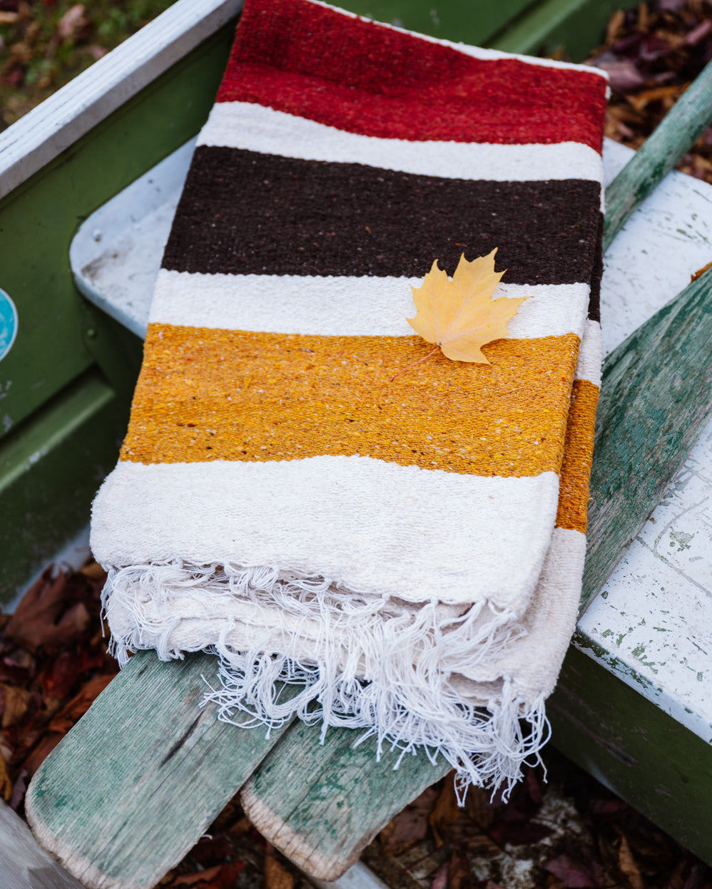 Striped blanket in a boat