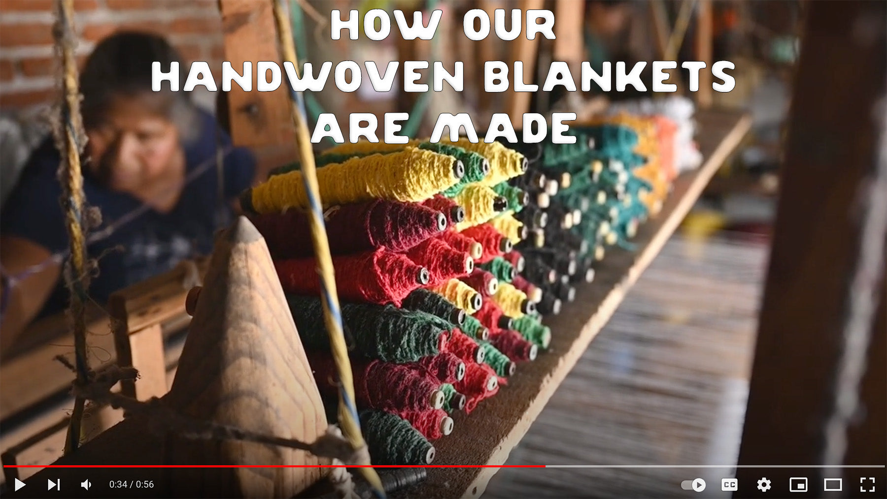 Screencap of handwoven blanket process youtube video