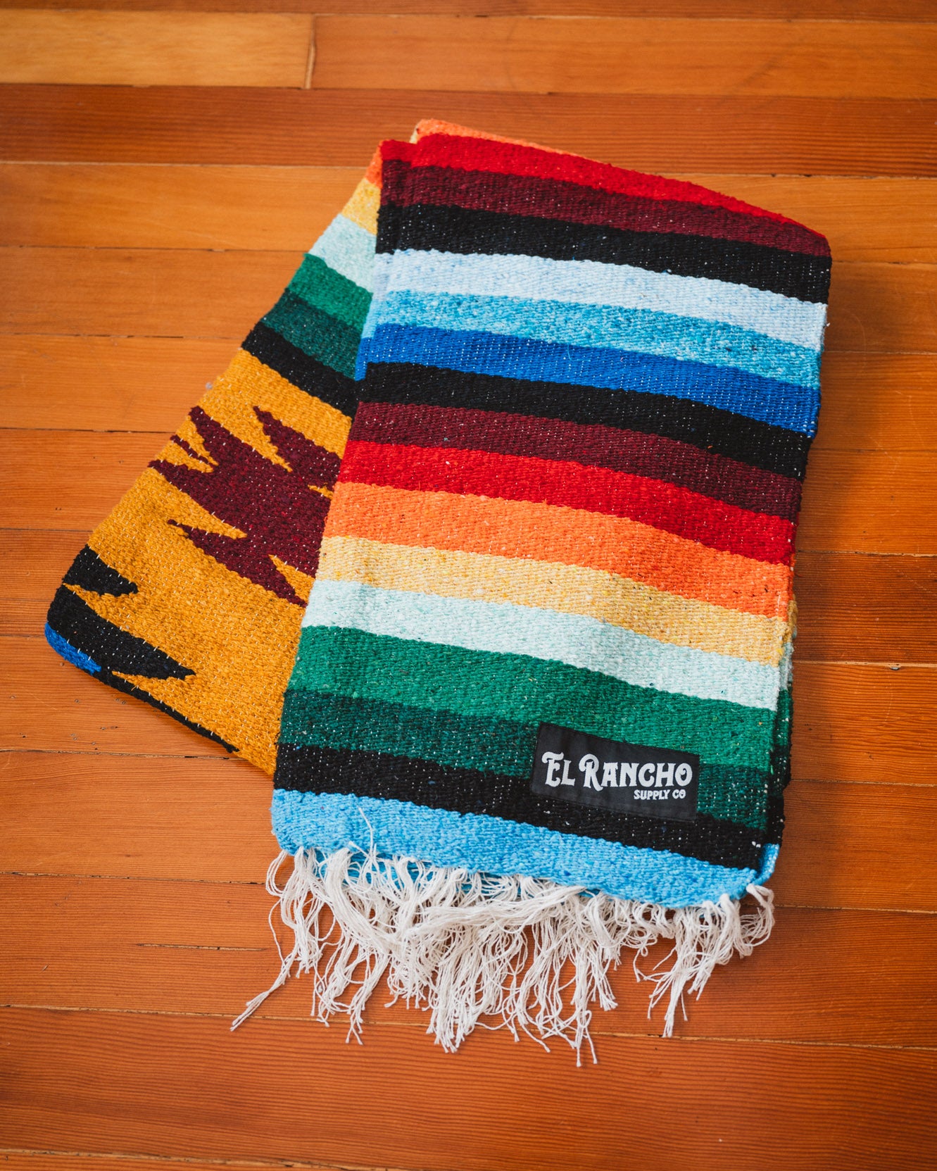 Rainbow diamond blanket on the floor