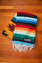 Rainbow diamond blanket on the floor