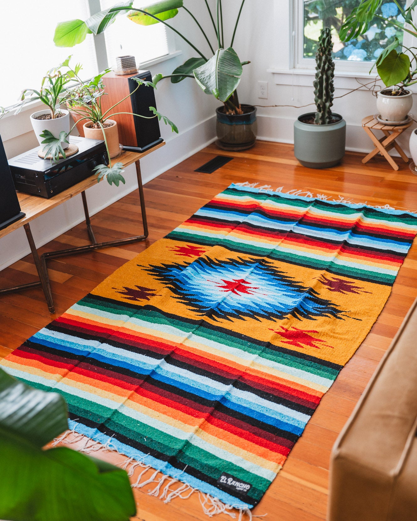 rainbow diamond blanket on the floor