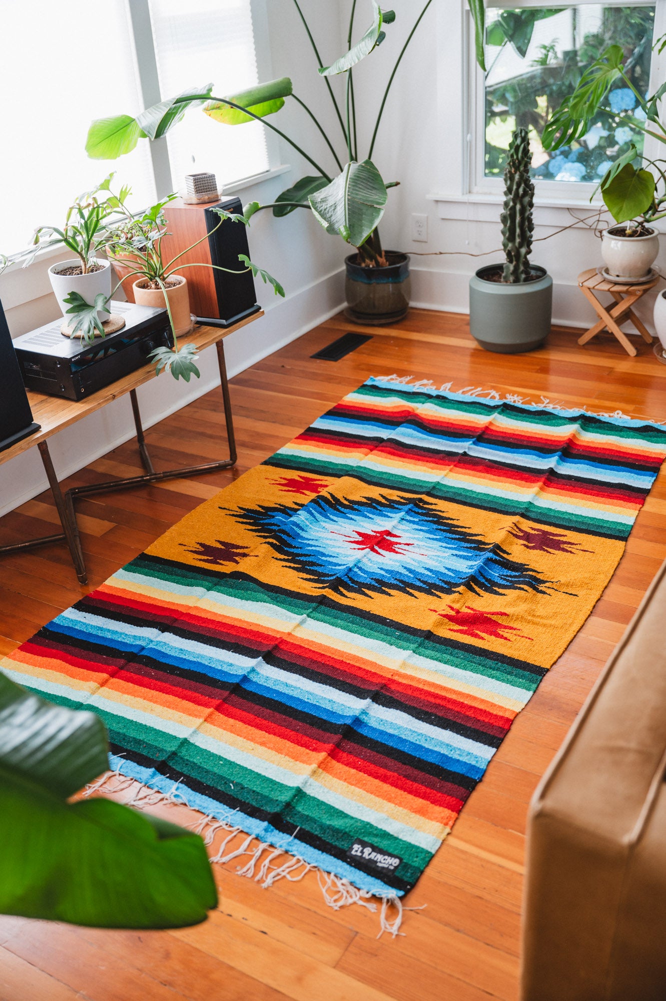 rainbow diamond blanket on the floor