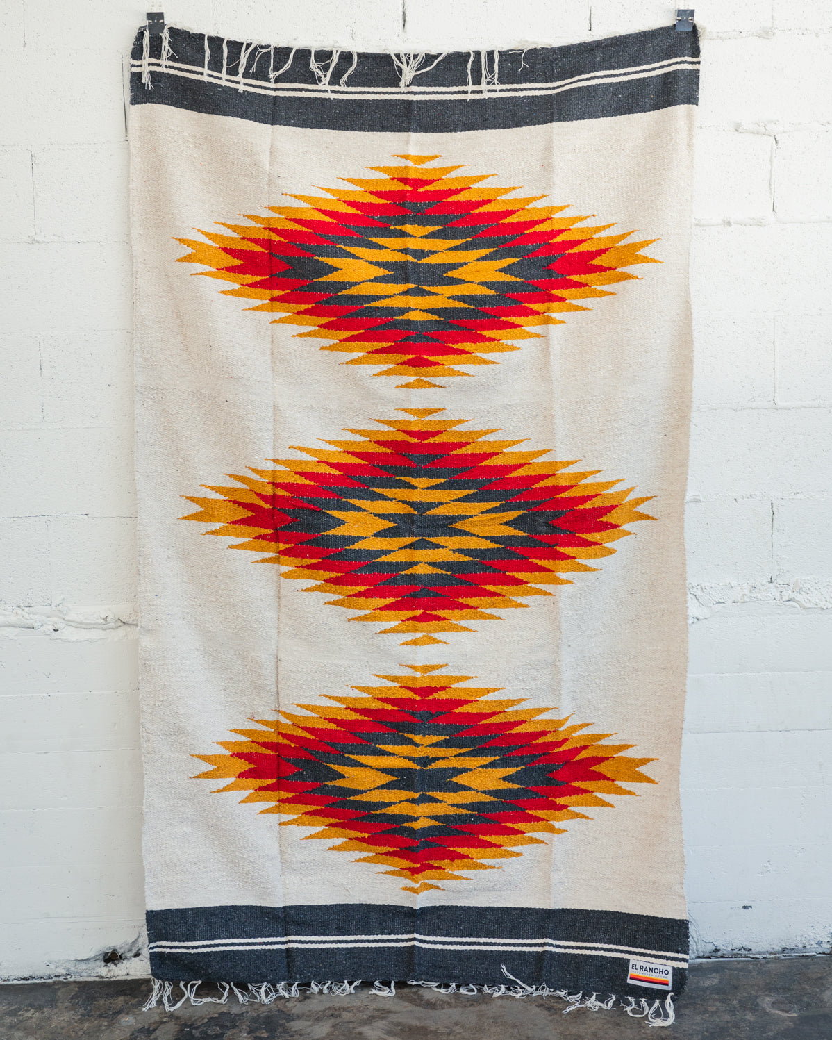 Red and yellow and black southwestern diamond handwoven blanket