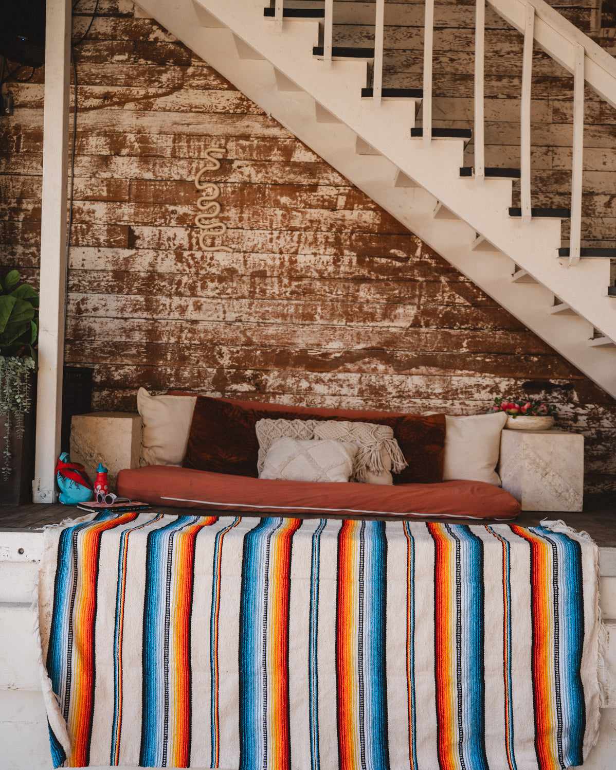 Socal Saltillo handwoven Blanket hanging in a urban loft