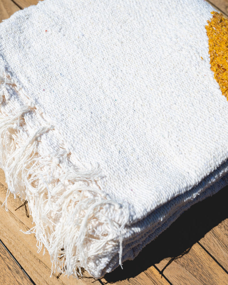 Cream Solar lunar handowoven mexican blanket folded