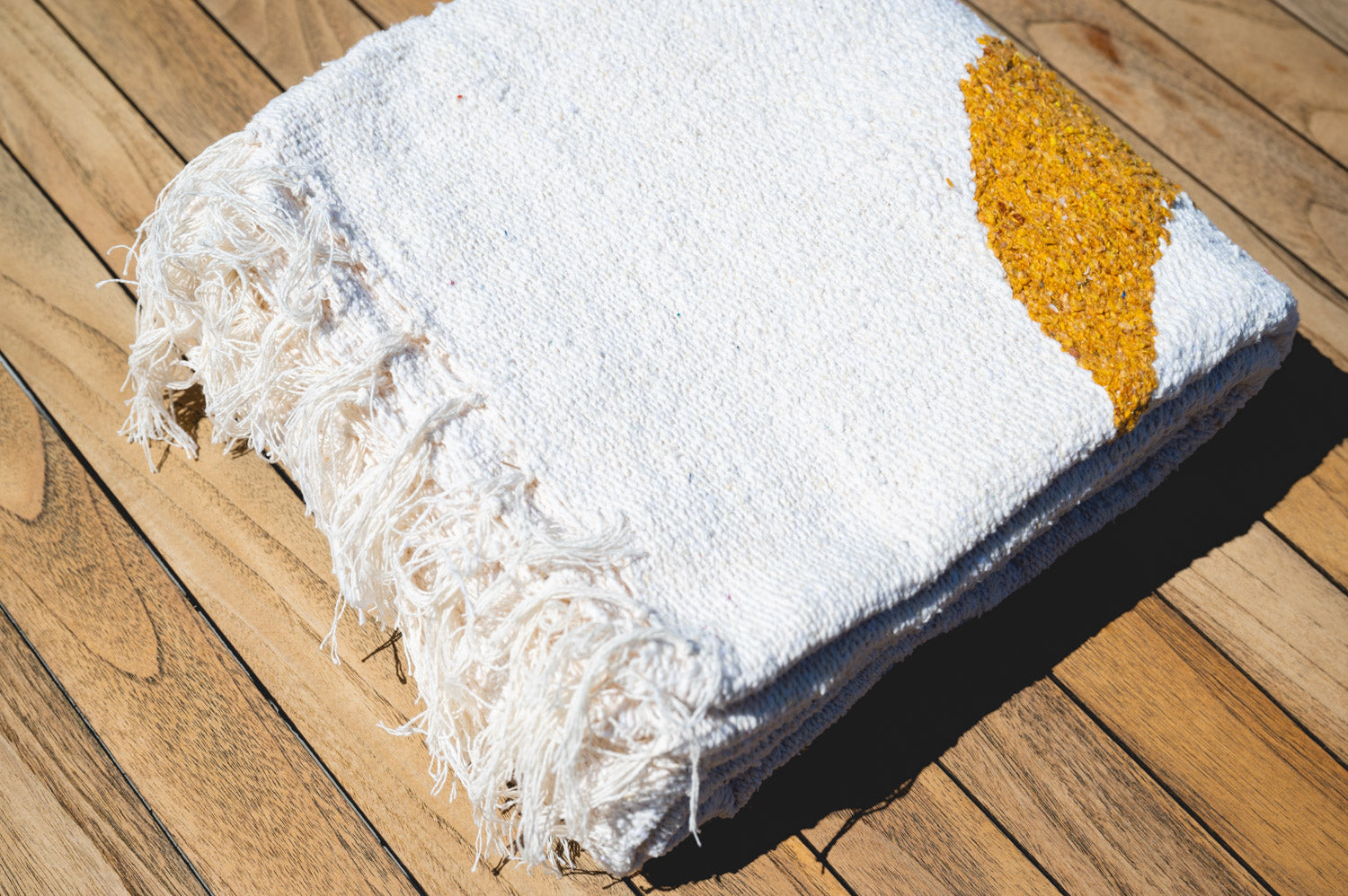 Cream Solar lunar handowoven mexican blanket folded