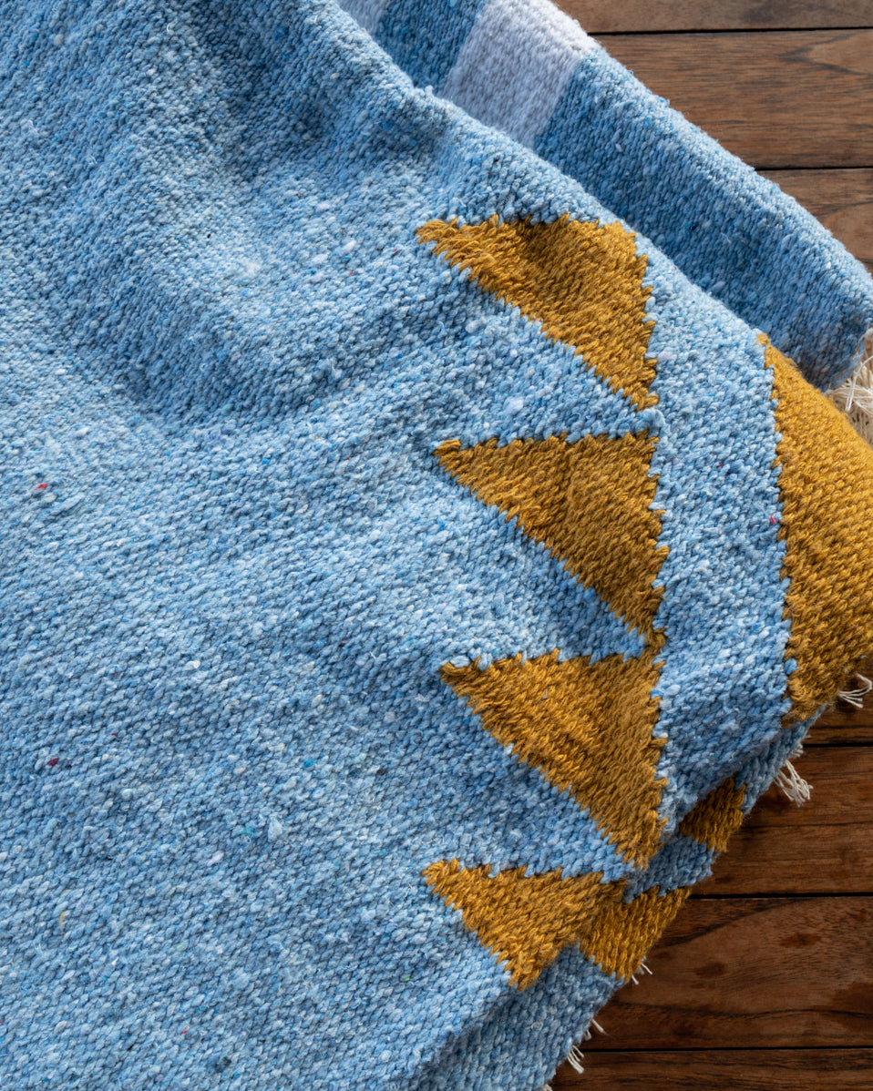 Blue folded mexican blanket