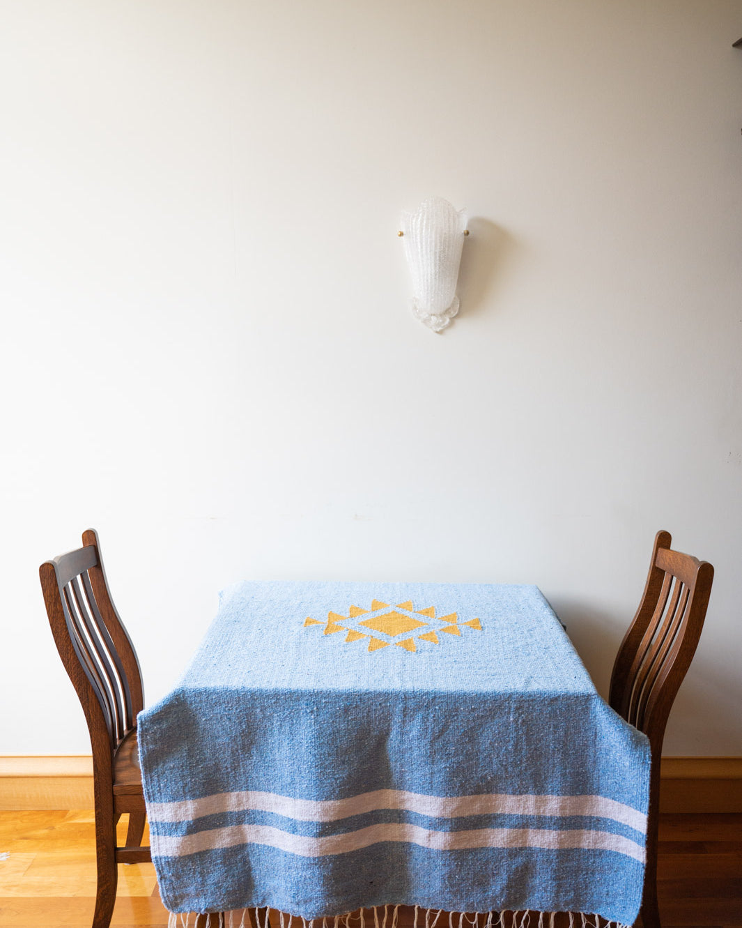 blue mexican blanket on a table top