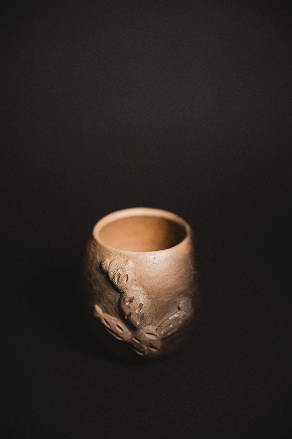 Oaxacan Black Clay Cactus mezcal copita on black background