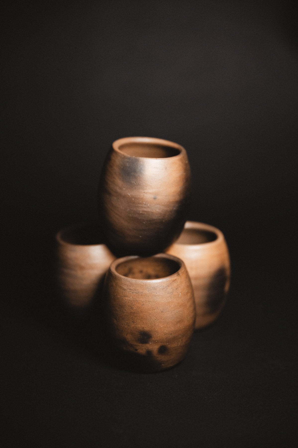 Oaxacan Black Clay mezcal copita on black background