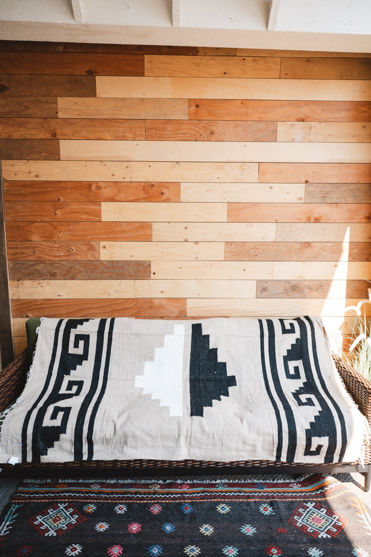 Handwoven Mexican Blanket beige Mixteca Greca  pattern in modern industrial setting