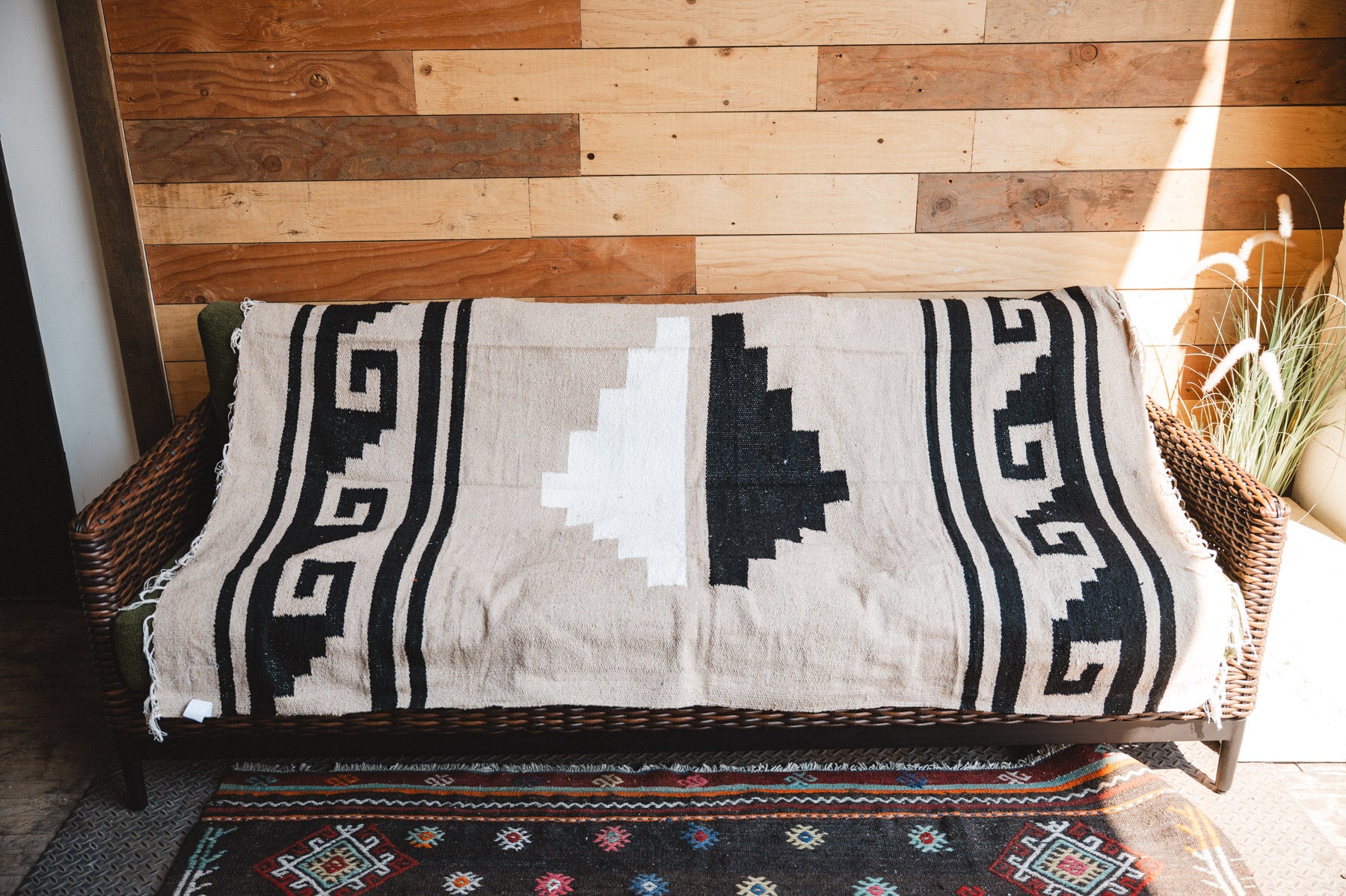 Handwoven Mexican Blanket beige Mixteca Greca  pattern in modern industrial setting