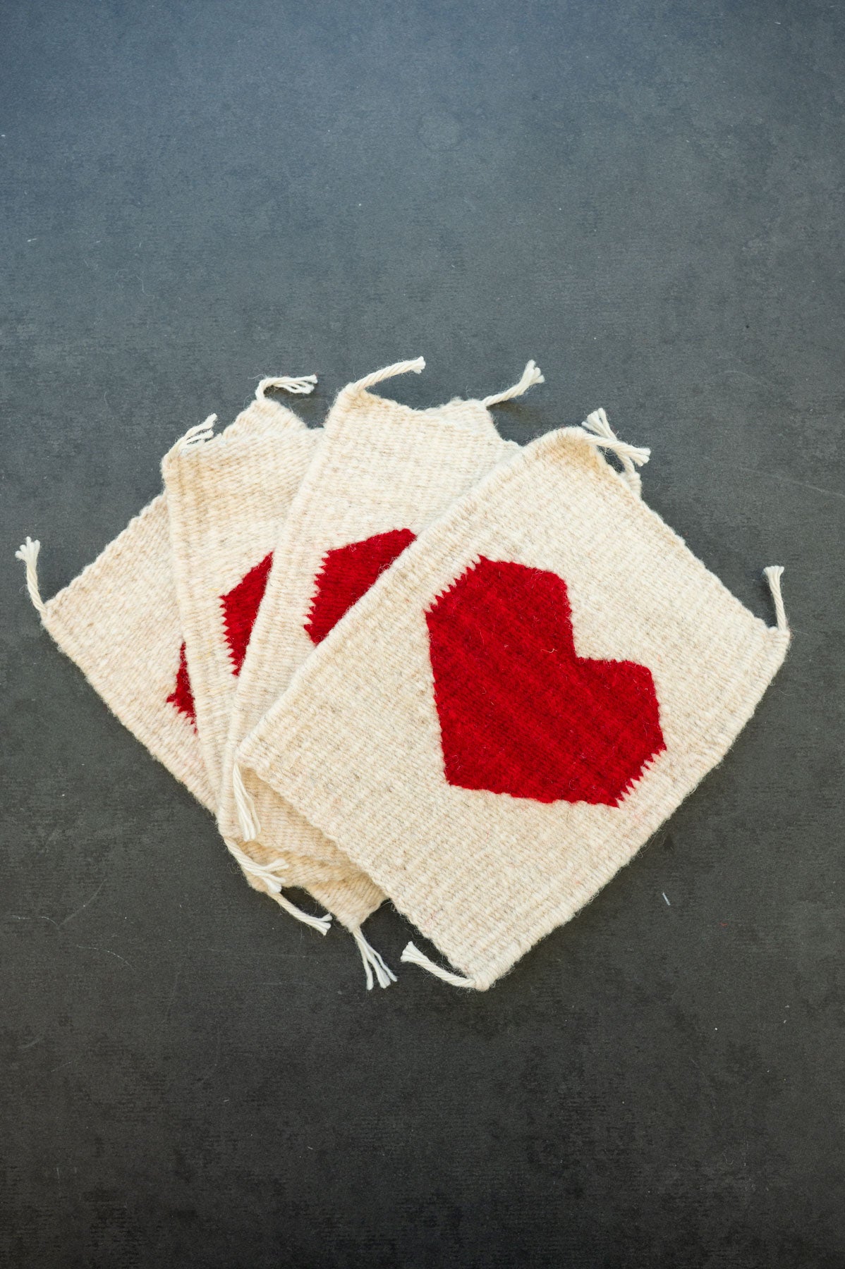 Handwoven wool coaster from Teotitlan Del Valle of a heart