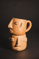 Oaxacan barro coffee cups stacked 