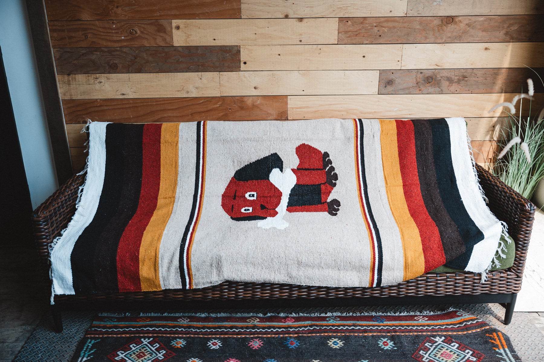 Handwoven Mexican Dog blanket in modern industrial setting