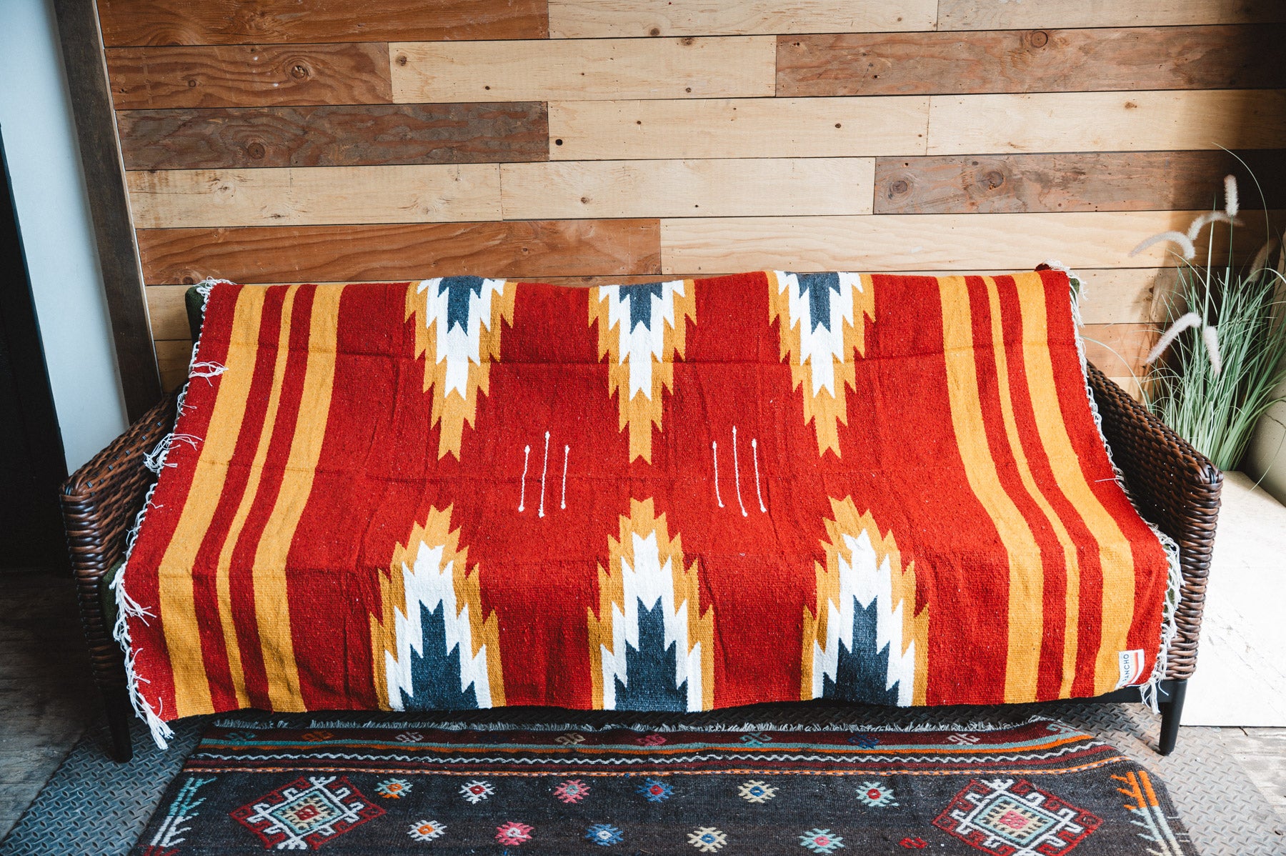 Handwoven Mexican Blanket Relampago pattern in modern industrial setting