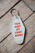 Retro Motel Keychain on wooden Floor