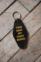 Retro Motel Keychain on wooden Floor