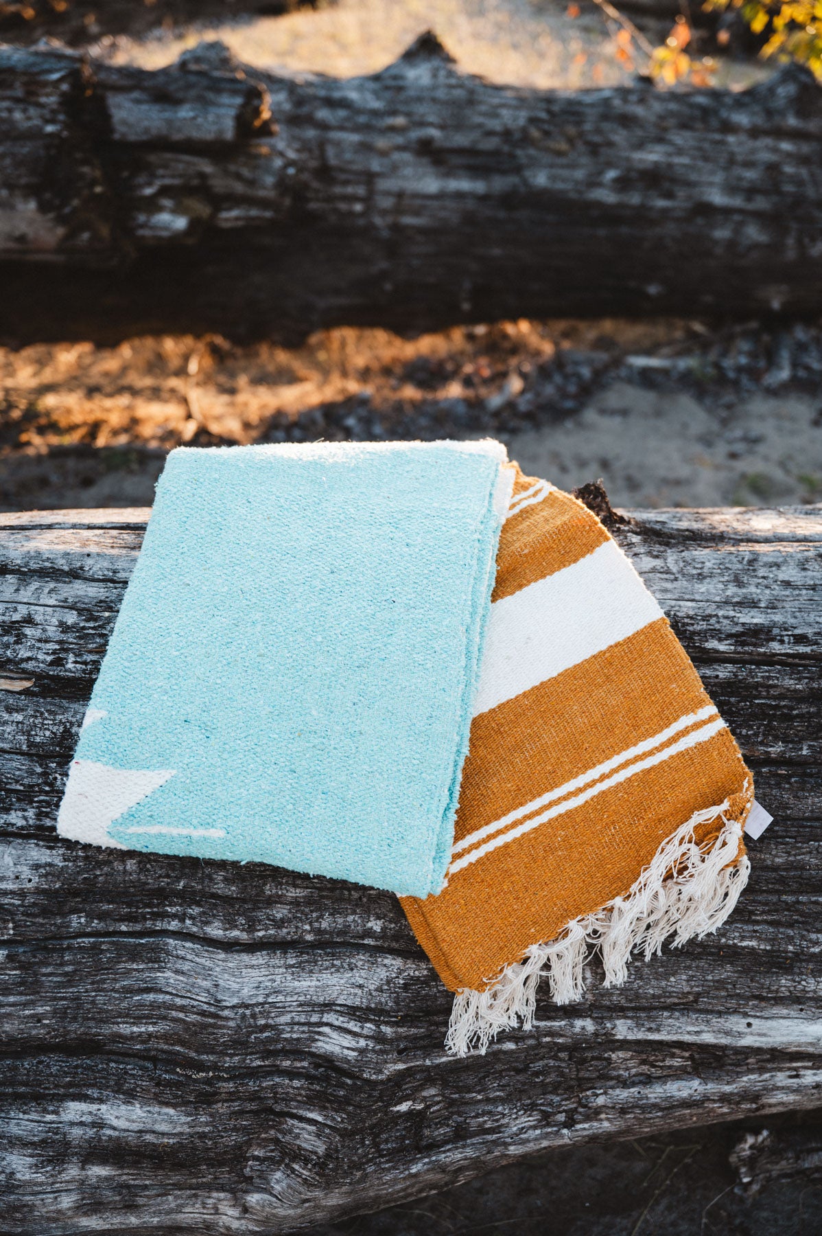 Folded turquoise mexican blanket